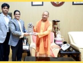 CM Yogi meets Sify Chairman Raju Vegesna