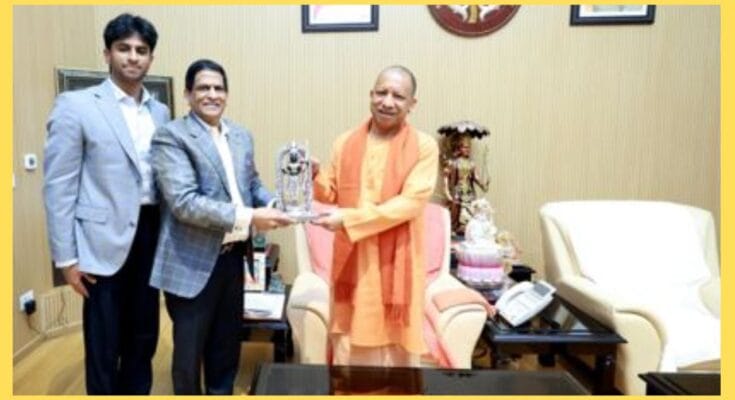 CM Yogi meets Sify Chairman Raju Vegesna